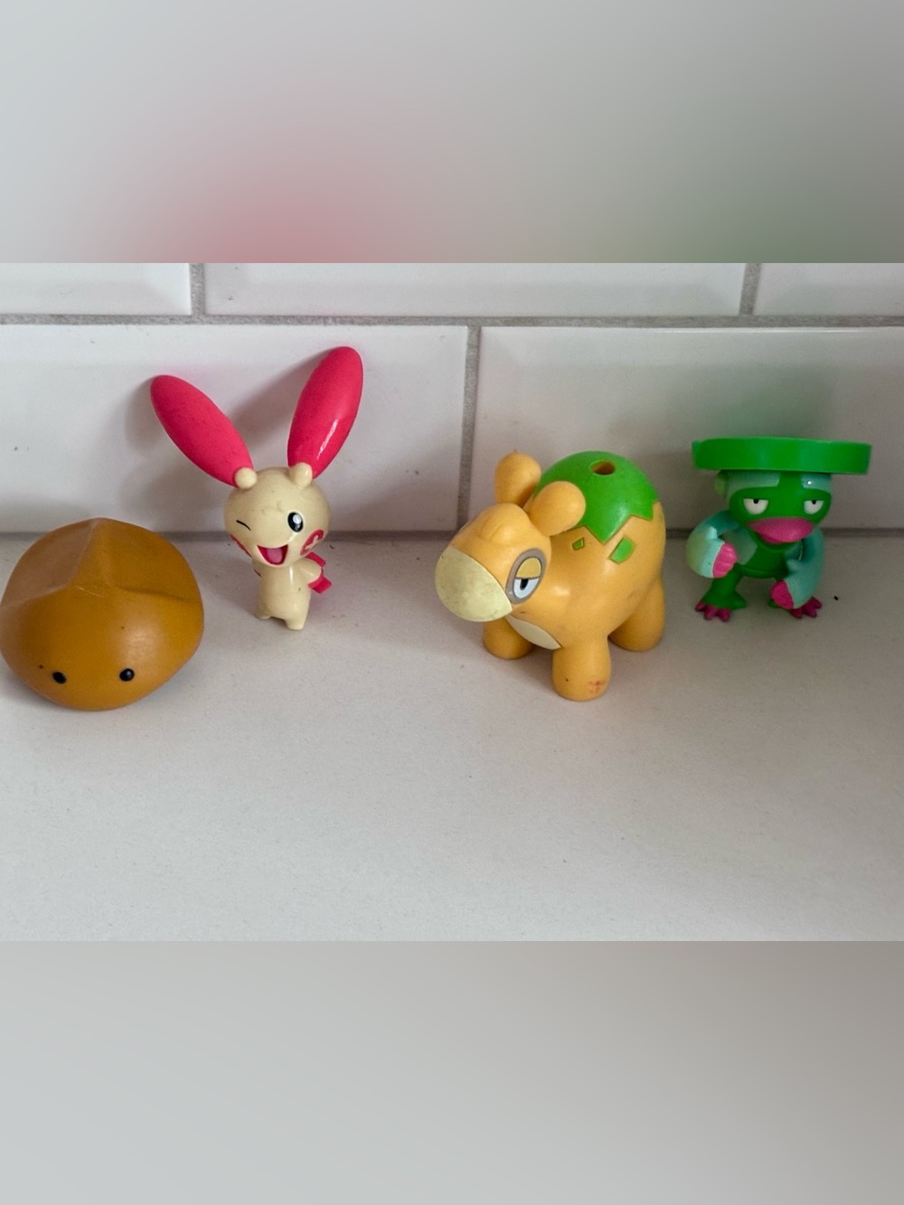 Pokémon figurines Kabuto, Plusle, Numel, Lombre Jakks 2007